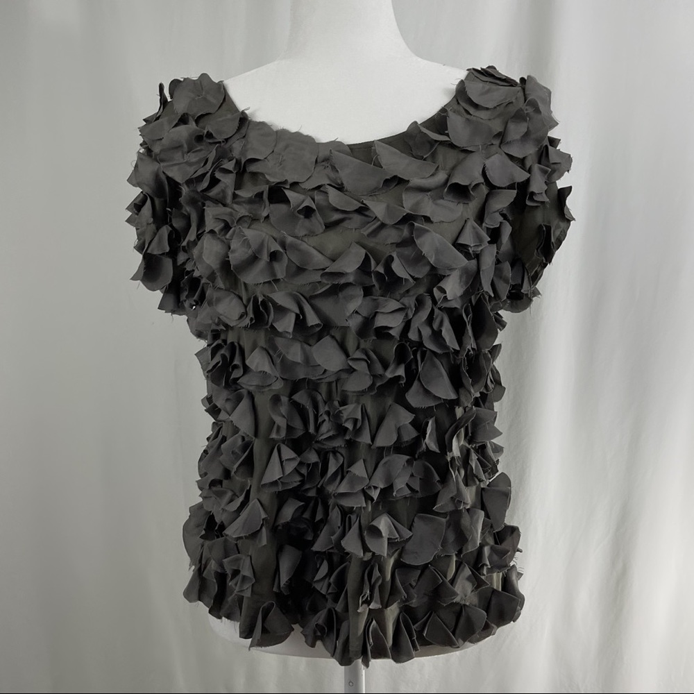 Gray silk blouse.